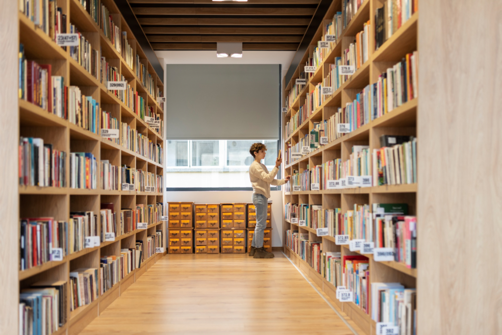 woman searching book in Library